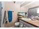 Clean bathroom with vanity, shower, and toilet at 2044 Sheffield Ct, Oldsmar, FL 34677
