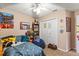bedroom with a twin bed, built in closet, and shelving at 2044 Sheffield Ct, Oldsmar, FL 34677