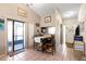 Bright dining area with table and chairs, access to a screened patio at 2044 Sheffield Ct, Oldsmar, FL 34677