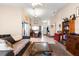 Open concept living room with a view of the dining area and kitchen at 2044 Sheffield Ct, Oldsmar, FL 34677