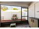 Screened patio with small yard and storage cabinet at 2044 Sheffield Ct, Oldsmar, FL 34677