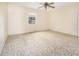 Large bedroom with tile floors and ceiling fan at 4700 18Th N Ave, St Petersburg, FL 33713