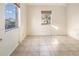 Spacious bedroom with tile floors and two windows at 4700 18Th N Ave, St Petersburg, FL 33713