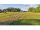 Large grassy lot perfect for development opportunities at 6106 Hartford St, Tampa, FL 33619