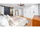 Main bedroom with barn door, hardwood floors, and built-in wardrobe at 6468 5Th N Ave, St Petersburg, FL 33710