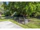 Fenced dog park with shaded areas for pets to play at 10263 Gandy N Blvd # 111, St Petersburg, FL 33702