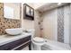 Bathroom with updated vanity, shower, and mosaic tile at 10800 Us 19 N. # 230, Pinellas Park, FL 33782