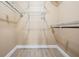 Large walk-in closet with wire shelving and hanging rods at 10800 Us 19 N. # 230, Pinellas Park, FL 33782