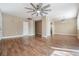 Dining area with wood-look floors and ceiling fan at 10800 Us 19 N. # 230, Pinellas Park, FL 33782