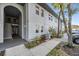 Exterior view of building showcasing landscaping and parking at 10800 Us 19 N. # 230, Pinellas Park, FL 33782