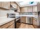 Kitchen with stainless steel appliances and wood cabinets at 10800 Us 19 N. # 230, Pinellas Park, FL 33782