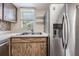 Kitchen features stainless steel appliances and wood cabinets at 10800 Us 19 N. # 230, Pinellas Park, FL 33782