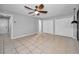 Spacious bedroom with ceiling fan and double closets at 11409 Donneymoor Dr, Riverview, FL 33569