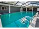 Inviting pool with screened enclosure, perfect for relaxation at 11409 Donneymoor Dr, Riverview, FL 33569