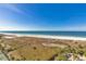 Aerial view of beach, boardwalk, and resort amenities at 1200 Gulf Blvd # 1104, Clearwater Beach, FL 33767