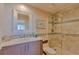 Updated bathroom with glass shower and modern vanity at 1200 Gulf Blvd # 1104, Clearwater Beach, FL 33767