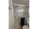 Bathroom featuring a shower with glass doors and a showerhead at 13225 101St St # 451, Largo, FL 33773