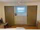 Bedroom closet with built-in drawers and windows, providing storage at 13225 101St St # 451, Largo, FL 33773