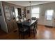 Inviting dining area featuring a dining table with seating for six and stylish built-in shelving at 13225 101St St # 451, Largo, FL 33773
