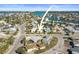 Aerial view of a single-Gathering home located on a corner lot, near the water at 13995 Island Dr, Madeira Beach, FL 33708