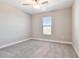 Spacious bedroom with neutral walls and carpet flooring at 21291 Snowy Orchid Ter, Land O Lakes, FL 34637