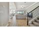 View of the living room showcasing an open floor plan and access to outdoor living at 21291 Snowy Orchid Ter, Land O Lakes, FL 34637