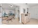 Open-concept dining area, seamlessly connects to the living room, kitchen, and adjacent living area at 2232 Greenwich Dr # 56, Sun City Center, FL 33573