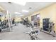 Well-equipped fitness center with modern exercise machines and ample space for a full body workout at 2232 Greenwich Dr # 56, Sun City Center, FL 33573