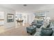 Spacious living area featuring a comfy sofa and ottoman at 2232 Greenwich Dr # 56, Sun City Center, FL 33573