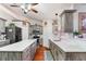 Updated kitchen featuring an island and wood cabinets at 2318 Landover Blvd, Spring Hill, FL 34608