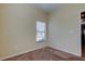 Bright bedroom with window, neutral walls, and carpet at 31225 Claridge Pl, Wesley Chapel, FL 33543