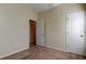 Bedroom with doors to hallway and bathroom at 31225 Claridge Pl, Wesley Chapel, FL 33543
