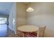Bright breakfast nook with small table and chairs at 31225 Claridge Pl, Wesley Chapel, FL 33543