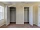 Two empty closets with double doors at 31225 Claridge Pl, Wesley Chapel, FL 33543