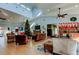 Community clubhouse with comfortable seating and a festive holiday atmosphere at 31225 Claridge Pl, Wesley Chapel, FL 33543
