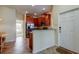 Modern kitchen with stainless steel appliances and wood cabinets at 31225 Claridge Pl, Wesley Chapel, FL 33543