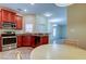 Modern kitchen with stainless steel appliances and granite countertops at 31225 Claridge Pl, Wesley Chapel, FL 33543
