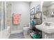 Clean bathroom with a toilet, sink, and bathtub at 3132 Nautical S Pl, St Petersburg, FL 33712
