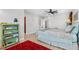 Bright bedroom with wood floors and a view at 3132 Nautical S Pl, St Petersburg, FL 33712