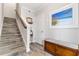 Bright entryway with tile flooring and wooden bench at 3132 Nautical S Pl, St Petersburg, FL 33712
