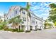 New construction townhomes featuring two-car garages, and beautiful tropical landscaping at 3132 Nautical S Pl, St Petersburg, FL 33712