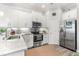 Modern kitchen with white cabinets and stainless steel appliances at 3132 Nautical S Pl, St Petersburg, FL 33712