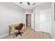 Small office with wood desk and chair, near hallway at 3132 Nautical S Pl, St Petersburg, FL 33712