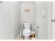 Small powder room with toilet and pedestal sink at 3132 Nautical S Pl, St Petersburg, FL 33712