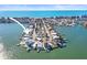 Aerial view of a home situated on a quiet waterfront at 353 144Th Ave, Madeira Beach, FL 33708