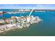 Aerial view of a waterfront home with private boat dock at 353 144Th Ave, Madeira Beach, FL 33708