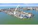 Aerial view of waterfront home with private dock and boat lift at 353 144Th Ave, Madeira Beach, FL 33708