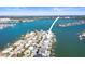 Aerial view showcasing waterfront property and boat access at 353 144Th Ave, Madeira Beach, FL 33708