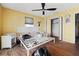 Bright bedroom with a white bed frame and access to a closet at 353 144Th Ave, Madeira Beach, FL 33708