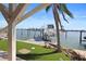 Private dock with boat lift and waterfront views at 353 144Th Ave, Madeira Beach, FL 33708